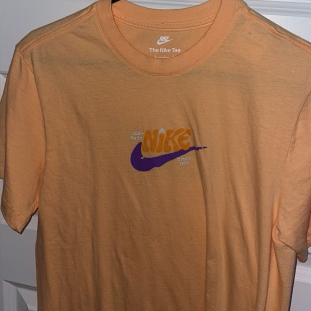 small orange & purple nike graphic tee